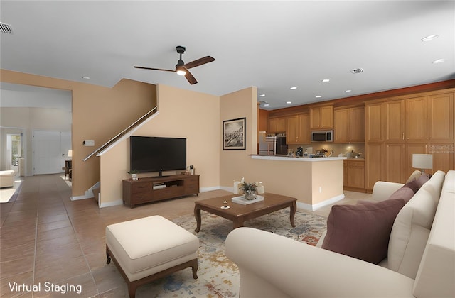 5412 72nd Ter E, Ellenton, FL 34222 - living area with a ceiling fan, light tile patterned floors, baseboards, recessed lighting, and stairway