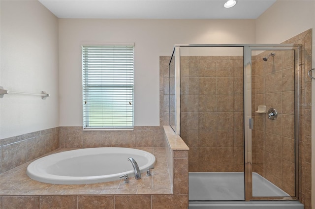 5412 72nd Ter E, Ellenton, FL 34222 - bathroom featuring a stall shower and a garden tub