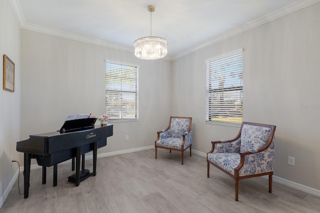 sitting room with crown molding, a notable chandelier, baseboards, and light wood-type flooring