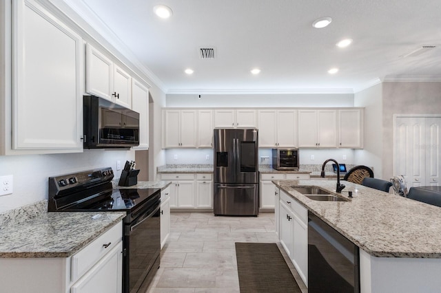 kitchen with a sink, black appliances, ornamental molding, and white cabinetry