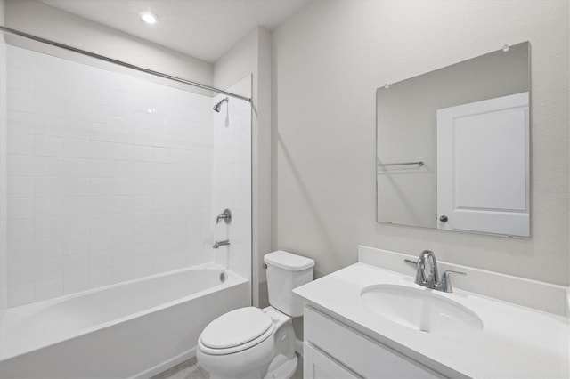 bathroom featuring vanity, toilet, and shower / bath combination