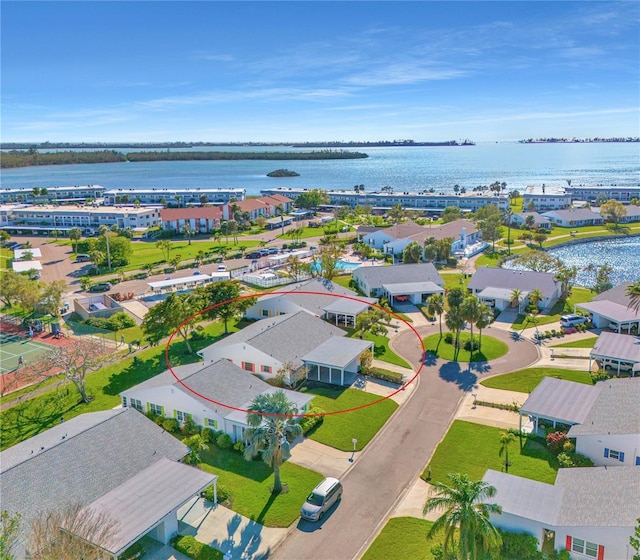 aerial view featuring a residential view and a water view