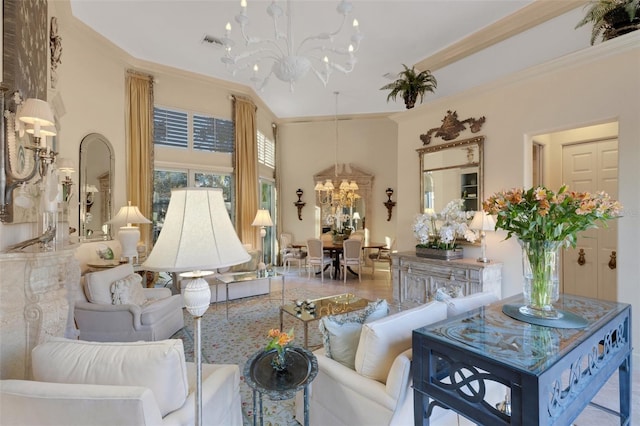 living room with visible vents, an inviting chandelier, and ornamental molding