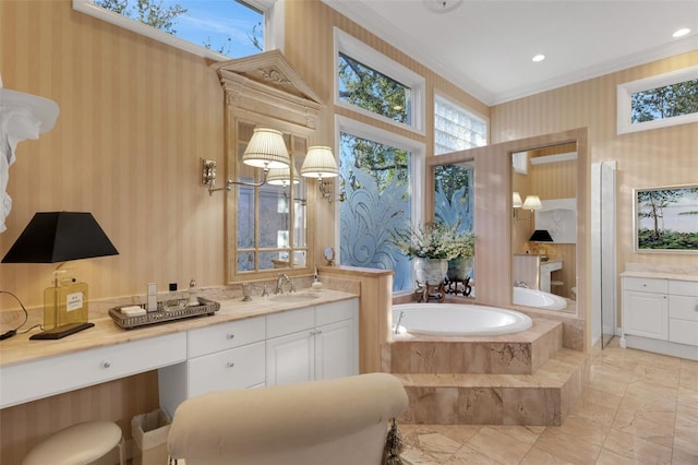 full bathroom with wallpapered walls, crown molding, a garden tub, marble finish floor, and vanity