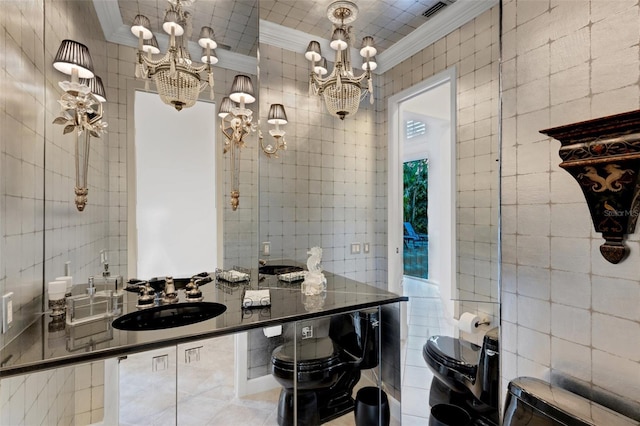 full bathroom featuring a sink, a notable chandelier, tile walls, and crown molding