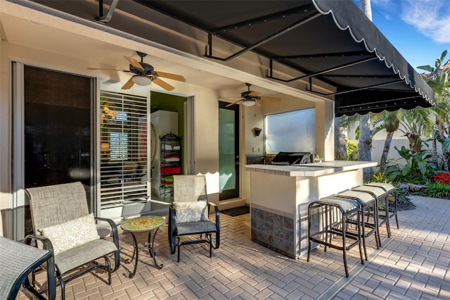 view of patio / terrace featuring an outdoor kitchen