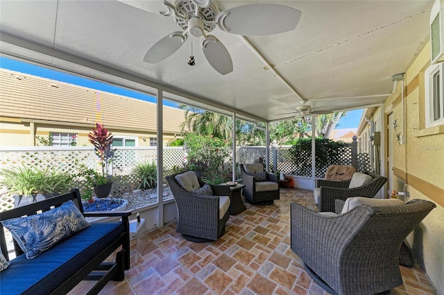 view of patio / terrace with ceiling fan, outdoor lounge area, and fence