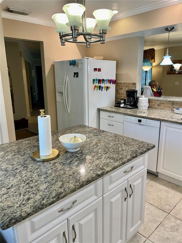 kitchen with visible vents, white appliances, crown molding, and white cabinetry