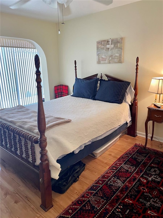 bedroom featuring wood finished floors