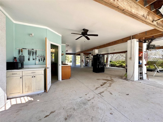 view of patio featuring ceiling fan