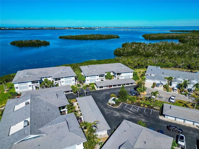 bird's eye view featuring a residential view and a water view