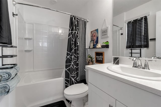 bathroom with toilet, shower / tub combo with curtain, and vanity