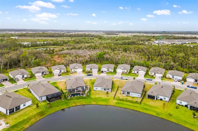 birds eye view of property featuring a residential view and a water view