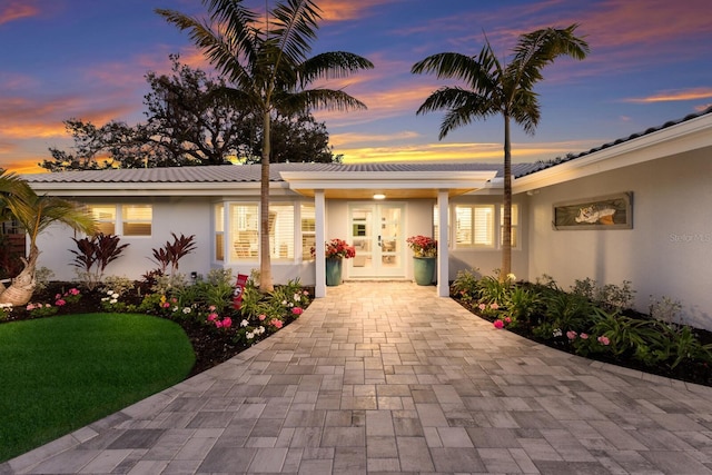 exterior space featuring stucco siding