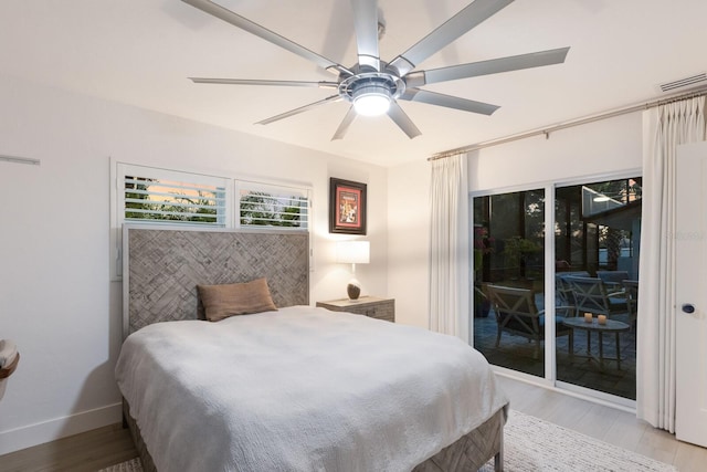 bedroom with visible vents, baseboards, light wood-style flooring, ceiling fan, and access to exterior