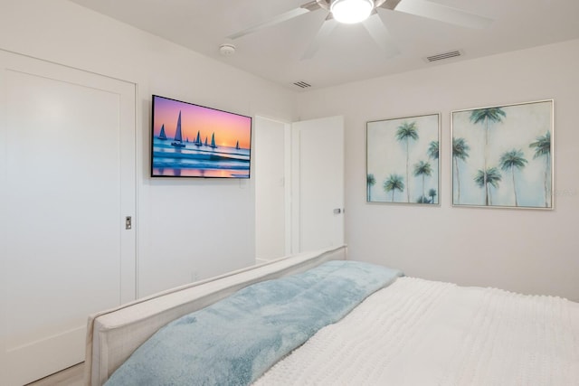 bedroom with visible vents and a ceiling fan