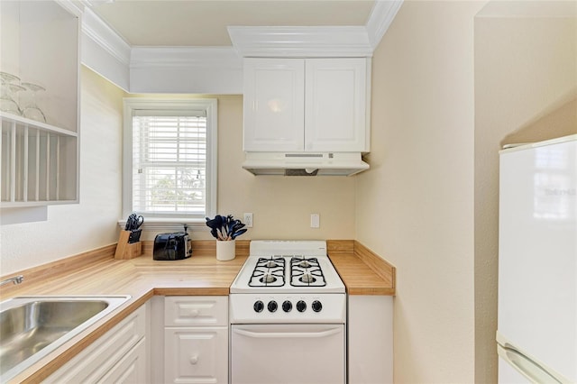 kitchen with ornamental molding, open shelves, white appliances, and under cabinet range hood