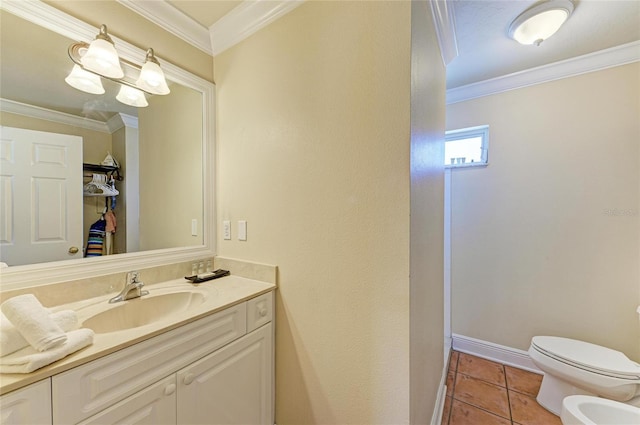 bathroom featuring toilet, a bidet, ornamental molding, and tile patterned floors