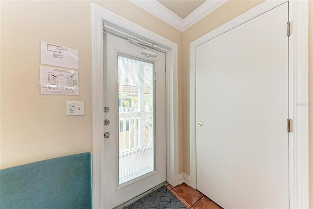 doorway featuring ornamental molding and light tile patterned flooring