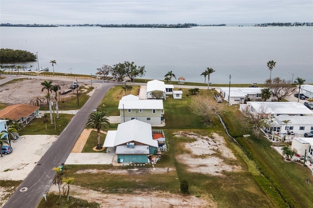 aerial view with a residential view and a water view