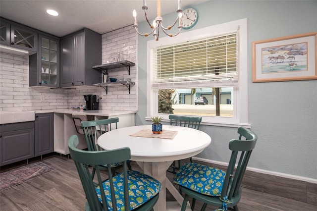 4524 106th St W, Bradenton, FL 34210 - dining area featuring dark wood-style flooring and a chandelier