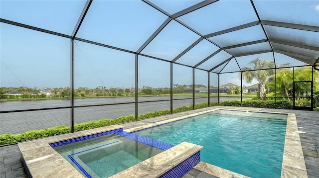 view of swimming pool featuring a lanai, a water view, and a pool with connected hot tub