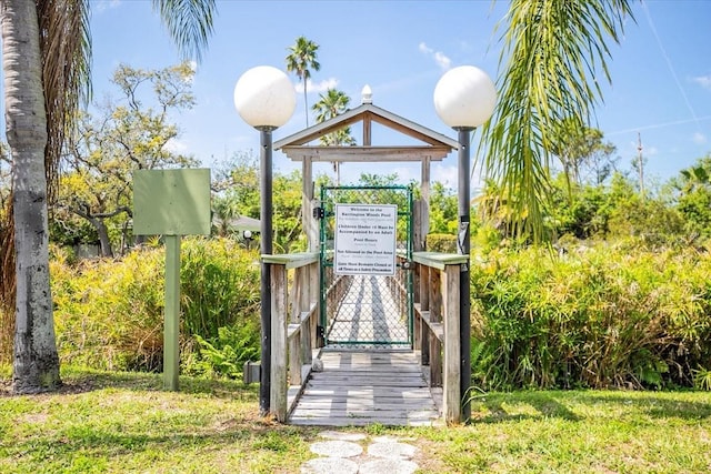 view of property's community with a gate