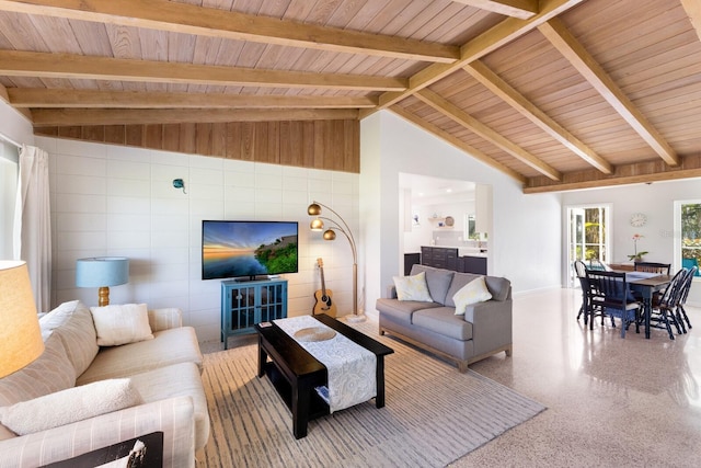 426 S Shore Dr, Sarasota, FL 34234 - living room with speckled floor, baseboards, wooden ceiling, and lofted ceiling with beams