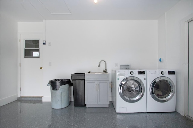 800 Everest Rd, Venice, FL 34293 - clothes washing area with baseboards, independent washer and dryer, cabinet space, and a sink