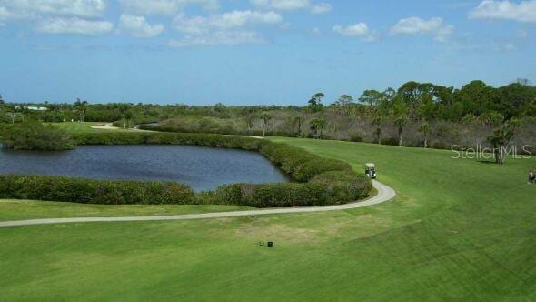 800 Everest Rd, Venice, FL 34293 - view of community with a lawn, golf course view, and a water view