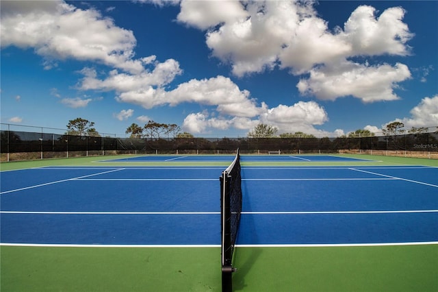 800 Everest Rd, Venice, FL 34293 - view of tennis court featuring community basketball court and fence