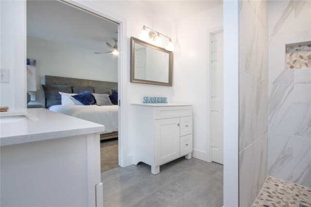 800 Everest Rd, Venice, FL 34293 - full bath featuring ceiling fan, a tile shower, ensuite bathroom, and vanity