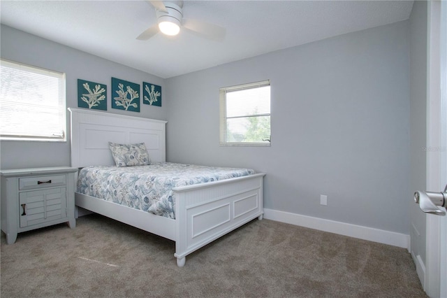 800 Everest Rd, Venice, FL 34293 - bedroom with baseboards, a ceiling fan, and light carpet