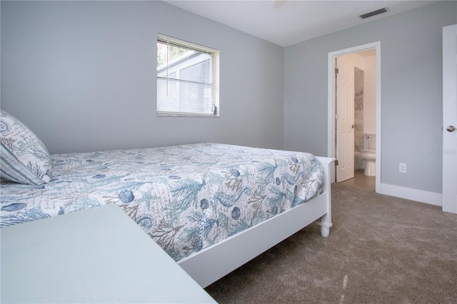 800 Everest Rd, Venice, FL 34293 - carpeted bedroom featuring baseboards, visible vents, and connected bathroom