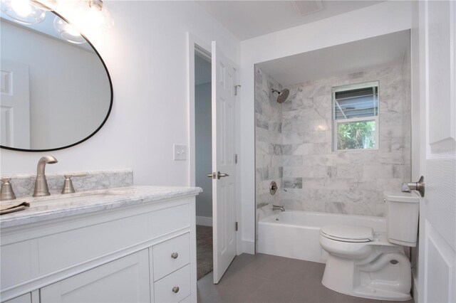 800 Everest Rd, Venice, FL 34293 - bathroom with toilet, tile patterned flooring,  shower combination, and vanity