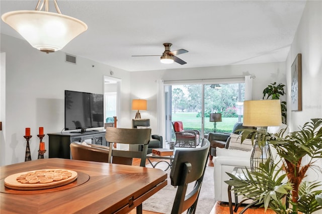 dining area with visible vents and ceiling fan