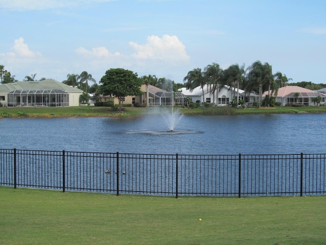 view of water feature featuring fence