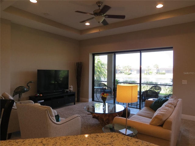 living room with recessed lighting, baseboards, and ceiling fan