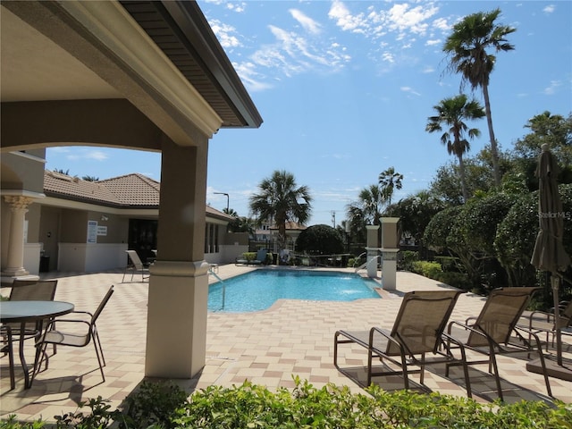 pool featuring a patio area