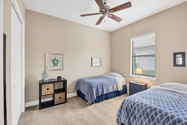 1290 Cielo Ct, North Venice, FL 34275 - carpeted bedroom with a closet, baseboards, and a ceiling fan