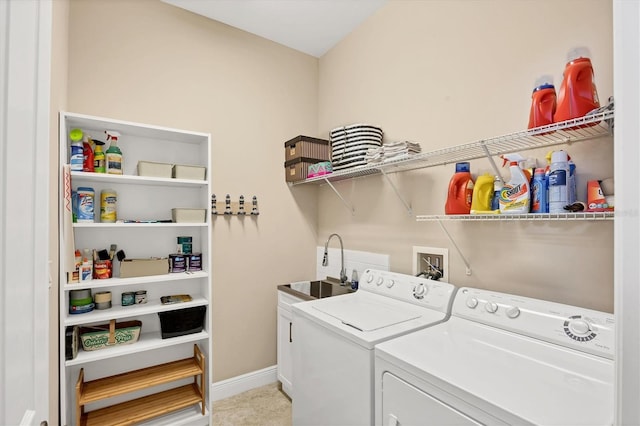 1290 Cielo Ct, North Venice, FL 34275 - clothes washing area featuring independent washer and dryer, cabinet space, and baseboards