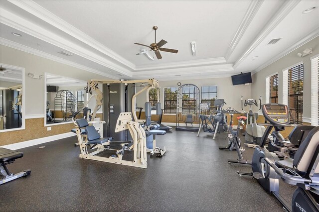 1290 Cielo Ct, North Venice, FL 34275 - workout area featuring ceiling fan, a tray ceiling, ornamental molding, and healthy amount of natural light
