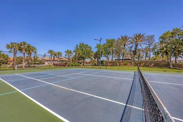 1290 Cielo Ct, North Venice, FL 34275 - view of tennis court featuring fence and community basketball court