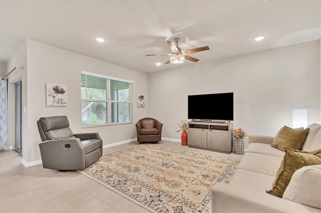 living room with light tile patterned floors, ceiling fan, baseboards, and recessed lighting