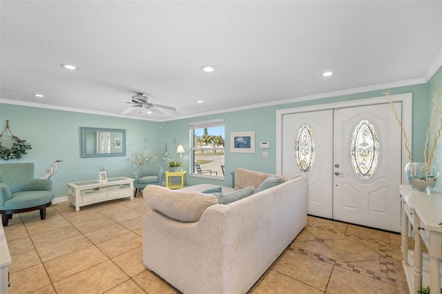 living area featuring baseboards, ceiling fan, ornamental molding, recessed lighting, and light tile patterned flooring