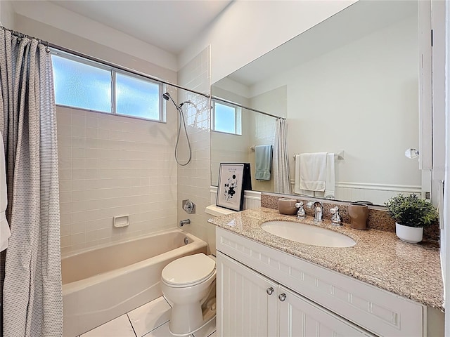 full bathroom featuring shower / bathtub combination with curtain, toilet, vanity, and tile patterned flooring