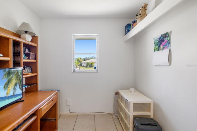 laundry room with light tile patterned floors