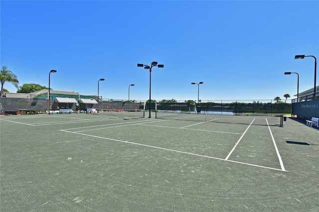 view of sport court with community basketball court and fence