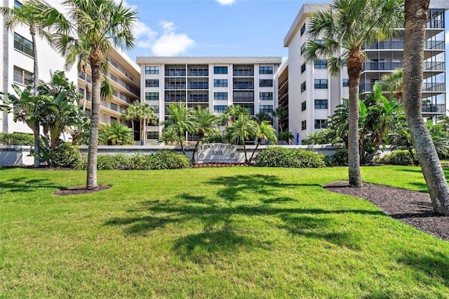 view of home's community featuring a yard