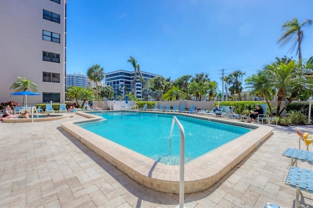 pool with a patio area